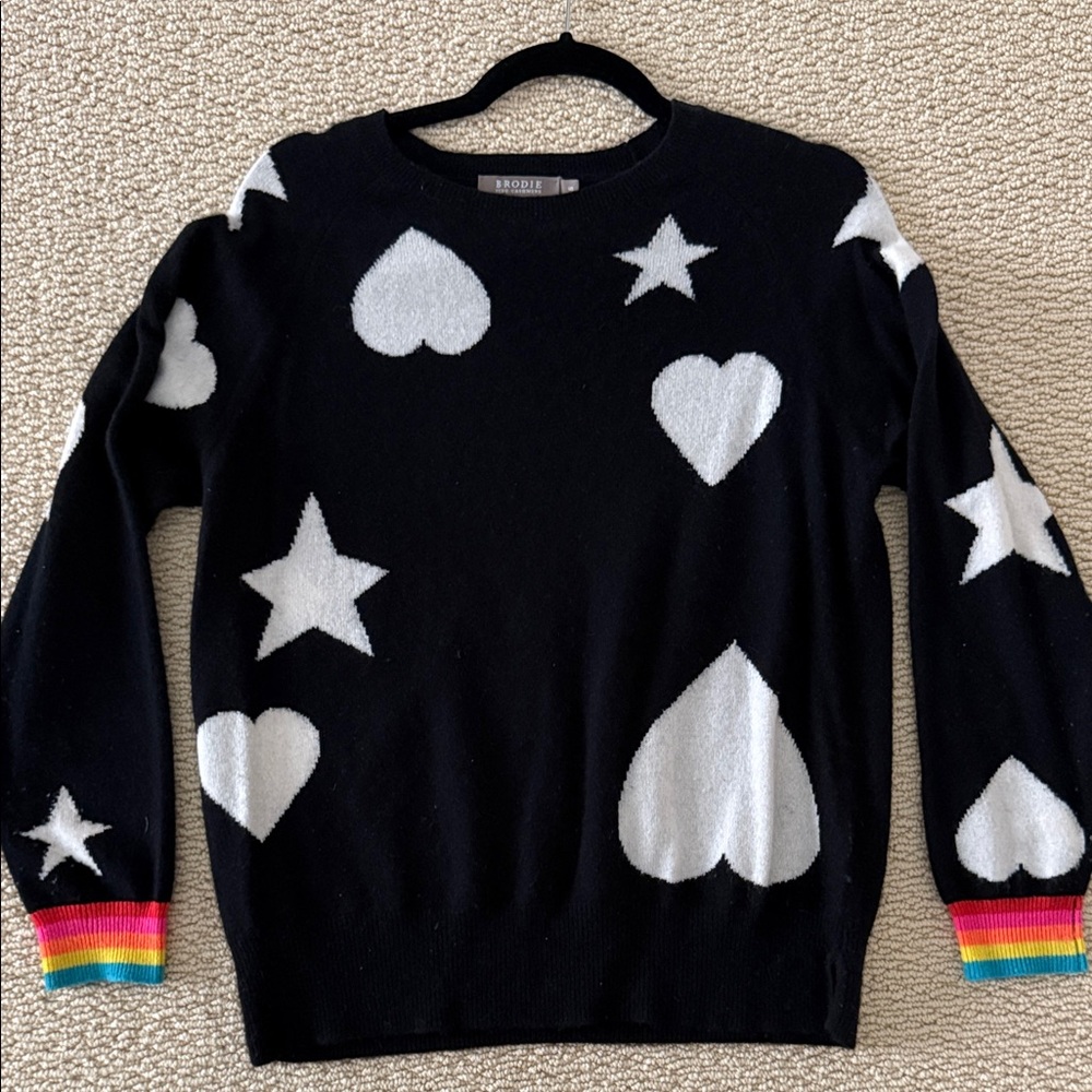 Brodie Black cashmere Sweater with White Hearts and Stars rainbow sleeves
